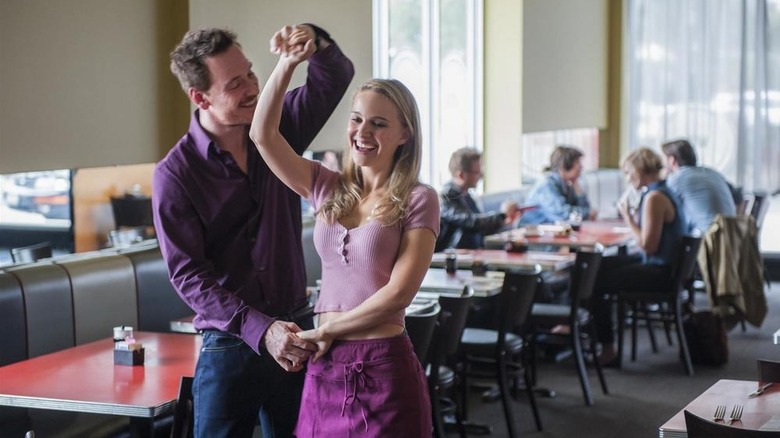 Portman dancing with Michael Fassbender in diner