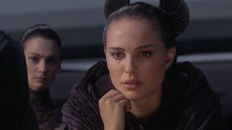 Padme looking intently at something 