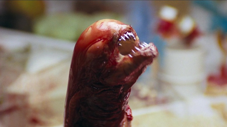 A chestburster covered in blood