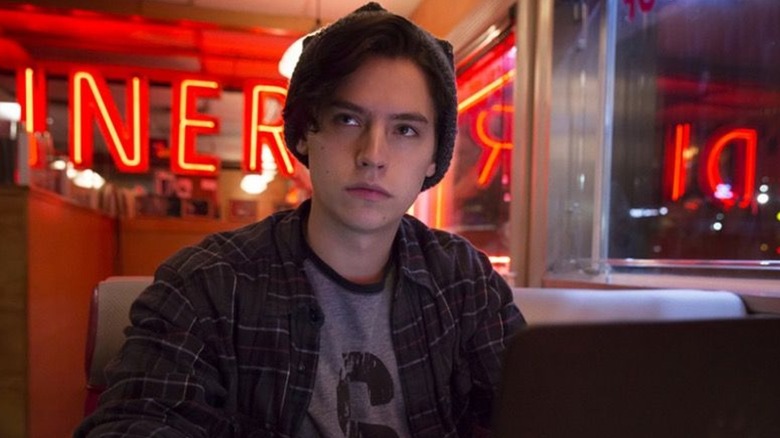 Jughead sitting in diner