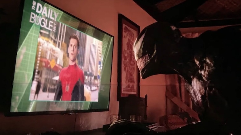 Venom watching Spider-Man on TV