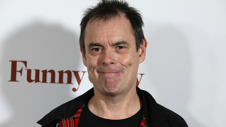 Kevin Eldon grinning cheekily