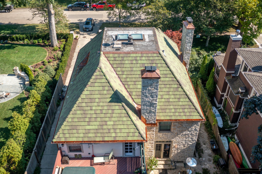 Evanston new roof with copper detail and chimney caps