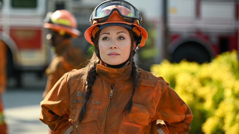 Rebecca Lee in firefighter uniform