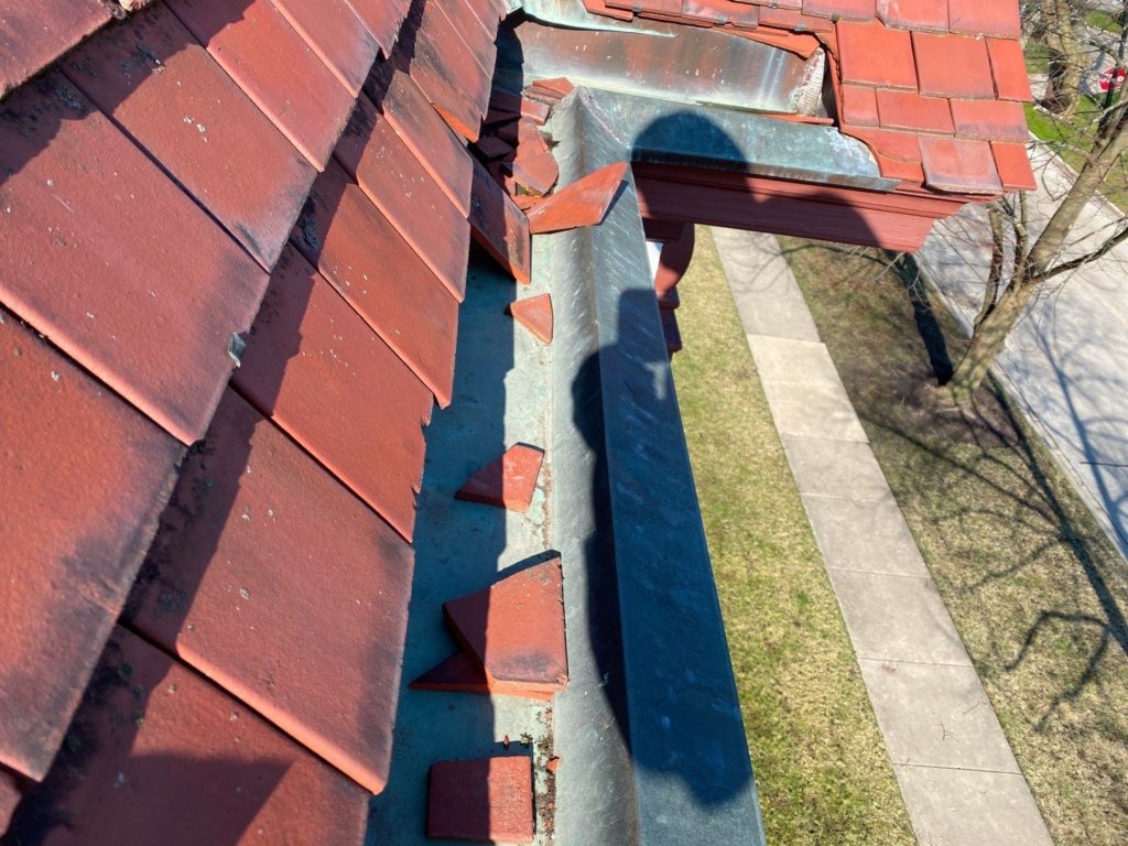 Copper and Tile damage before learning of new roof installation
