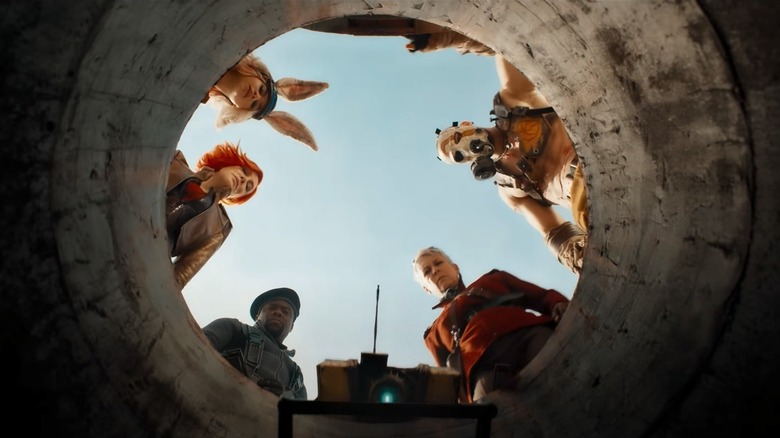 Borderlands crew looking down hole