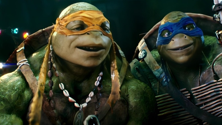 Michaelangelo and Leonardo smiling