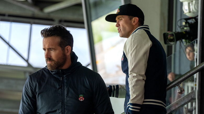 Ryan Reynolds and Rob McElhenney watching soccer