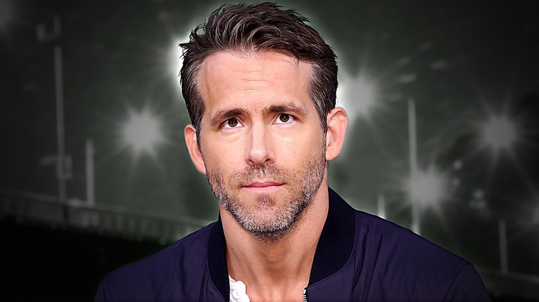 Ryan Reynolds looking up serious