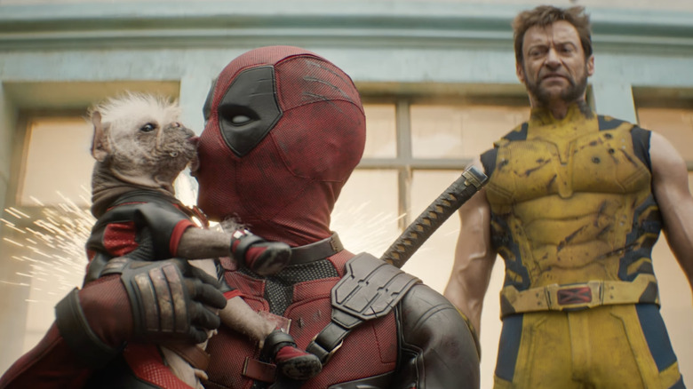 Wolverine watching Dogpool lick Deadpool