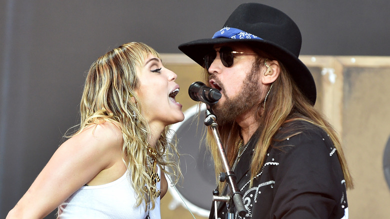 Miley singing with Billy Ray