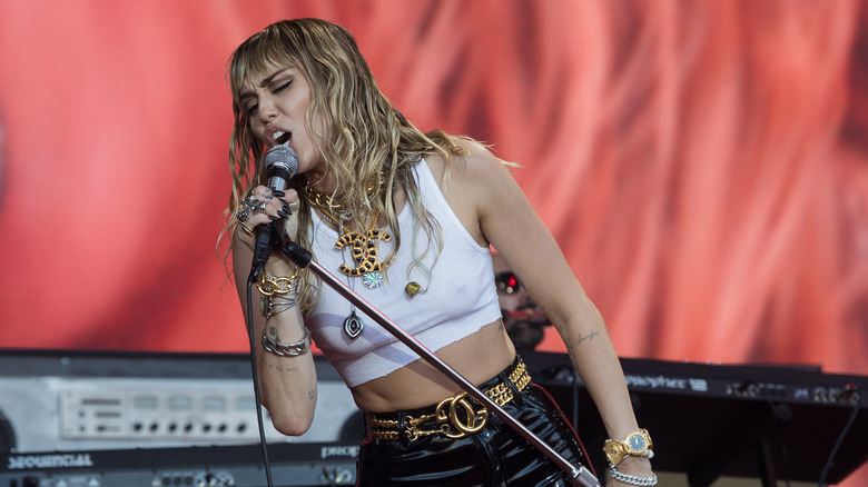 Miley performing at a festival