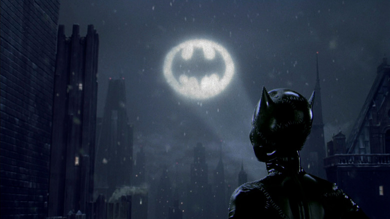 Catwoman looking at batsignal