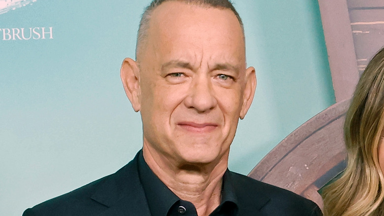 Tom Hanks poses for pictures