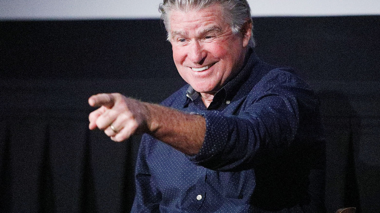 Treat Williams pointing