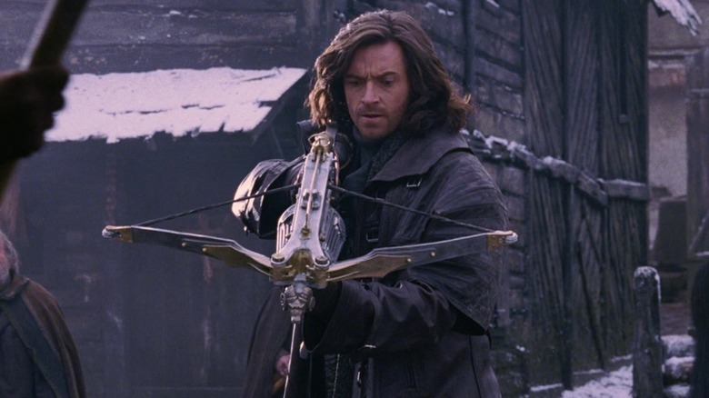 Van Helsing holding a crossbow