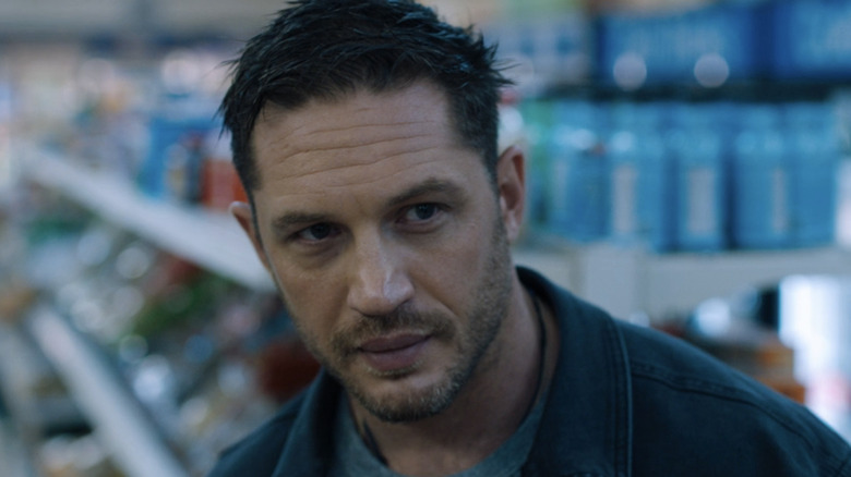 Eddie Brock in a convenience store