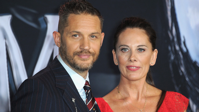 Tom Hardy and Kelly Marcel smiling